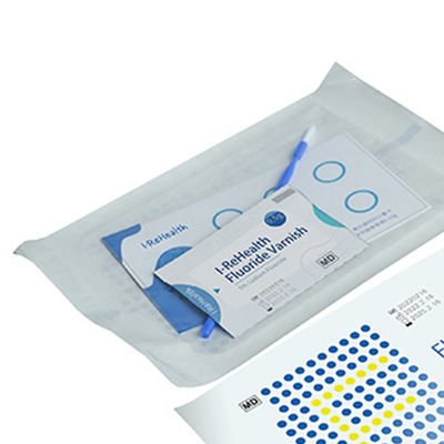 le vernis pédiatrique du fluorure 0.5g/Bag pour les dents des enfants s'inquiètent le traitement avec l'odeur de melon